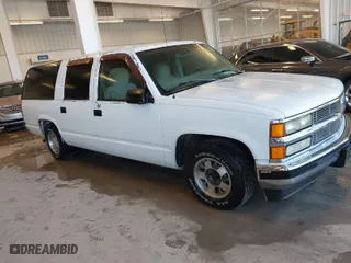 1998 Chevrolet Suburban with VIN 1GNEC16R5WJ358889, listed as a IAAI auction lot 41588573 with 185,298 mi miles. Bid and sale history available at carsss.com. Image 1.
