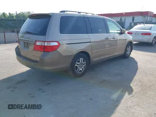2006 Honda Odyssey EX-L with VIN 5FNRL38656B414992, listed as a IAAI auction lot 42179924 with 298,440 mi miles. Bid and sale history available at carsss.com. Image 4.