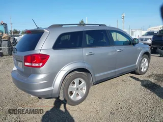 2018 Dodge Journey SE with VIN 3C4PDDAG9JT189824, listed as a IAAI auction lot 42208115 with 97,035 mi miles and . Bid and sale history available at DreamBid. Image 4.