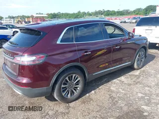 2020 Lincoln Nautilus Reserve with VIN 2LMPJ6K94LBL29717, listed as a IAAI auction lot 42388863 with Not provided miles and . Bid and sale history available at DreamBid. Image 4.