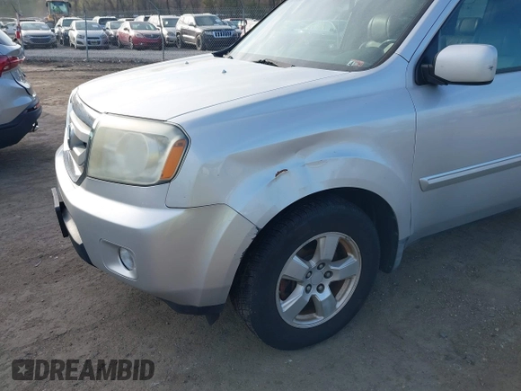 2009 Honda Pilot EX-L with VIN 5FNYF48559B034121, listed as a IAAI auction lot 41928138 with 193,969 mi miles. Bid and sale history available at carsss.com. Image 6.