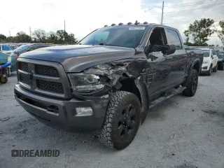 2016 Ram 2500 Laramie with VIN 3C6UR5FLXGG230499, listed as a Copart auction lot 60672185 with 152,049 mi miles and Salvage title. Bid and sale history available at DreamBid. Image 1.