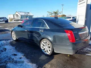2017 Cadillac CTS Luxury AWD z VIN 1G6AX5SX7H0176310, wystawiony jako IAAI lot #41293373 z przebiegiem 161 264 mil mil oraz . Historia ofert i sprzedaży dostępna na DreamBid. Obrazek 3.