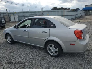 2006 Suzuki Forenza z VIN KL5JD56Z96K362651, wystawiony jako Copart lot #78306894 z przebiegiem 167 916 mil mil oraz Tytuł czysty. Historia ofert i sprzedaży dostępna na DreamBid. Obrazek 2.