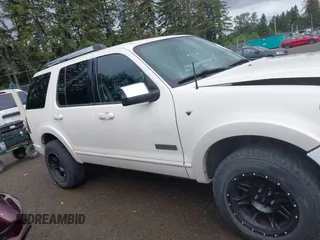 2007 Ford Explorer Limited z VIN 1FMEU75807UA80903, wystawiony jako IAAI lot #42304263 z przebiegiem 163 070 mil mil oraz . Historia ofert i sprzedaży dostępna na DreamBid. Obrazek 13.