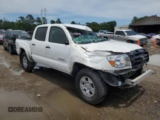 2010 Toyota Tacoma PreRunner with VIN 3TMJU4GN8AM102663, listed as a Copart auction lot 57782665 with 196,620 mi miles and Salvage title. Bid and sale history available at DreamBid. Image 4.