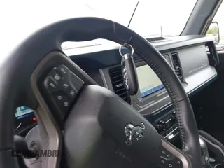 2023 Ford Bronco с VIN 1FMDE5BHXPLA83735, выставлен на аукционе IAAI как лот 42351136 с пробегом 34 737 миль миль и . История ставок и продаж доступна на DreamBid. Изображение 11.