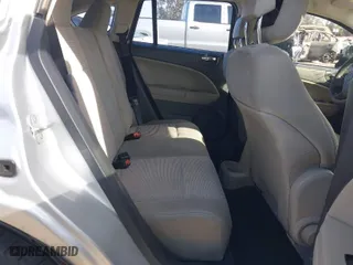 2010 Dodge Caliber SXT with VIN 1B3CB4HA3AD664526, listed as a IAAI auction lot 41401694 with 215,104 mi miles. Bid and sale history available at carsss.com. Image 8.