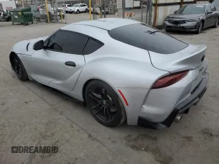 2021 Toyota GR Supra 3.0 with VIN WZ1DB0C0XMW039660, listed as a Copart auction lot 86909354 with 30,272 mi miles and Salvage Title. Bid and sale history available at carsss.com. Image 2.