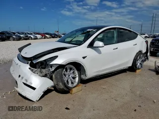 2023 Tesla Model Y Long Range z VIN 7SAYGDEE6PA093483, wystawiony jako Copart lot #53687465 z przebiegiem Nie podano mil oraz Szkoda całkowita • Salvage title. Historia ofert i sprzedaży dostępna na DreamBid. Obrazek 1.