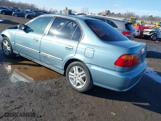 2000 Honda Civic EX with VIN 1HGEJ8649YL047194, listed as a IAAI auction lot 41526765 with 127,697 mi miles. Bid and sale history available at carsss.com. Image 3.
