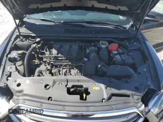 2014 Ford Taurus SEL z VIN 1FAHP2E82EG150298, wystawiony jako Copart lot #49546245 z przebiegiem 147 956 mil mil oraz Szkoda całkowita • Salvage title. Historia ofert i sprzedaży dostępna na DreamBid. Obrazek 13.