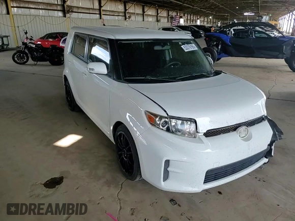 2012 Scion xB with VIN JTLZE4FE2CJ028761, listed as a Copart auction lot 53379165 with 131,758 mi miles and Salvage Title. Bid and sale history available at DreamBid. Image 12.