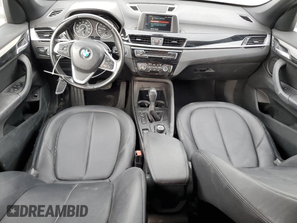 2018 BMW X1 sDrive28i with VIN WBXHU7C37J5H44386, listed as a Copart auction lot 42167135 with 96,668 mi miles and Salvage Title. Bid and sale history available at DreamBid. Image 8.