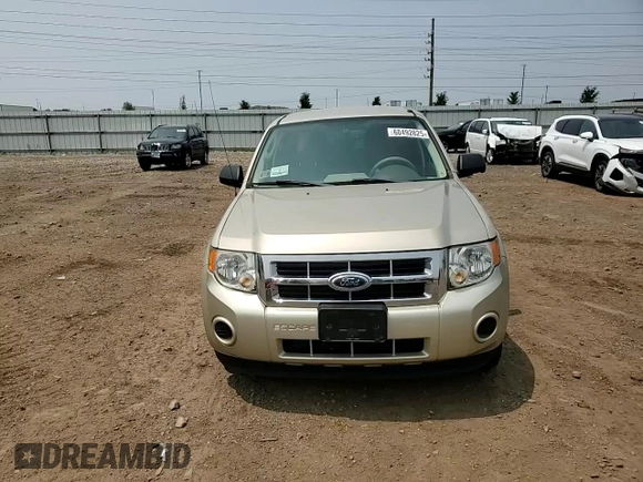 2011 Ford Escape XLS with VIN 1FMCU0C75BKC58172, listed as a Copart auction lot 60492825 with 114,518 mi miles and Salvage title. Bid and sale history available at DreamBid. Image 13.