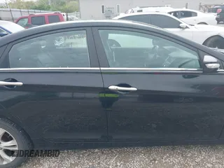 2011 Hyundai Sonata Limited z VIN 5NPEC4AC4BH032467, wystawiony jako IAAI lot #42127011 z przebiegiem 164 214 mil mil oraz . Historia ofert i sprzedaży dostępna na DreamBid. Obrazek 13.