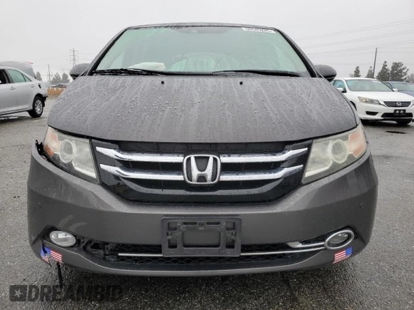 2016 Honda Odyssey Touring Elite with VIN 5FNRL5H97GB090094, listed as a Copart auction lot 50545285 with 158,334 mi miles and Salvage Title. Bid and sale history available at DreamBid. Image 5.