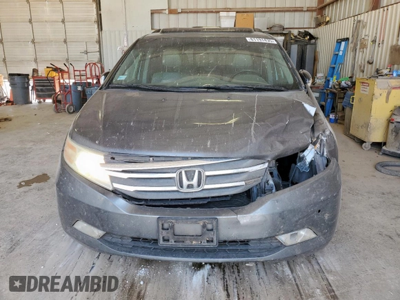2012 Honda Odyssey Touring с VIN 5FNRL5H94CB049626, выставлен на аукционе Copart как лот 61191435 с пробегом 199 728 миль миль и Списание • Salvage title. История ставок и продаж доступна на DreamBid. Изображение 5.