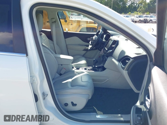 2019 Jeep Cherokee Limited with VIN 1C4PJLDX1KD302882, listed as a IAAI auction lot 42191309 with 79,426 mi miles and . Bid and sale history available at DreamBid. Image 5.