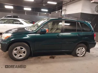 2003 Toyota RAV4 with VIN JTEGH20V130114281, listed as a IAAI auction lot 42144334 with 82,134 mi miles and . Bid and sale history available at carsss.com. Image 14.