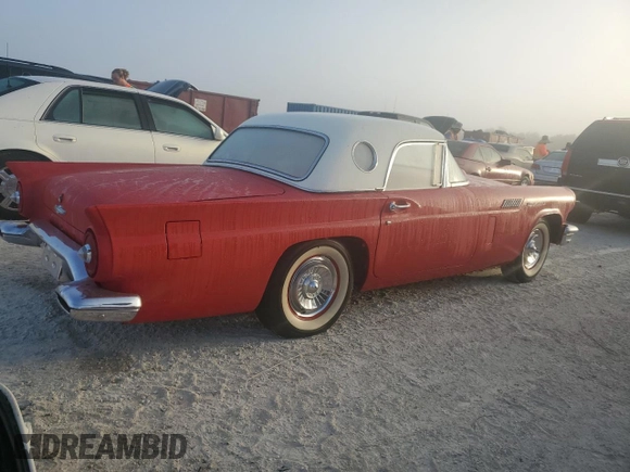 1957 Ford Thunderbird with VIN D7FH286272, listed as a Copart auction lot 77243694 with 19,878 mi miles and Salvage Title. Bid and sale history available at DreamBid. Image 3.
