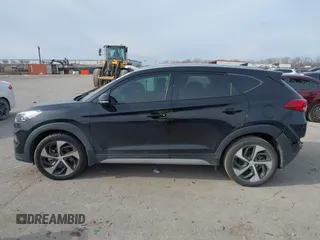 2018 Hyundai Tucson Sport with VIN KM8J33AL7JU772152, listed as a IAAI auction lot 41285203 with 87,188 mi miles. Bid and sale history available at carsss.com. Image 14.