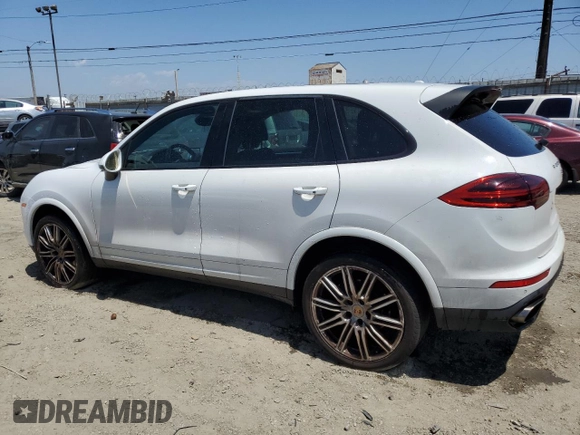 2018 Porsche Cayenne z VIN WP1AA2A29JKA01259, wystawiony jako Copart lot #55061165 z przebiegiem 100 451 mil mil oraz Czysty tytuł • Clean title. Historia ofert i sprzedaży dostępna na DreamBid. Obrazek 2.