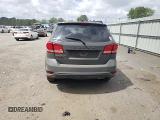 2019 Dodge Journey SE with VIN 3C4PDCBB0KT875474, listed as a Copart auction lot 52987395 with 76,816 mi miles and Salvage Title. Bid and sale history available at DreamBid. Image 6.