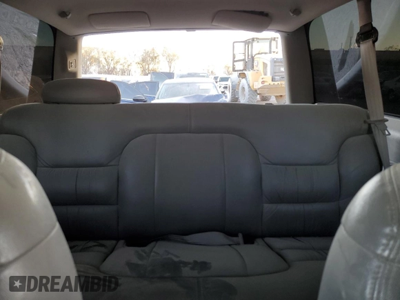 1999 Chevrolet Tahoe with VIN 3GNEC18R1XG143882, listed as a Copart auction lot 42177005 with 130,368 mi miles and Salvage title. Bid and sale history available at DreamBid. Image 10.
