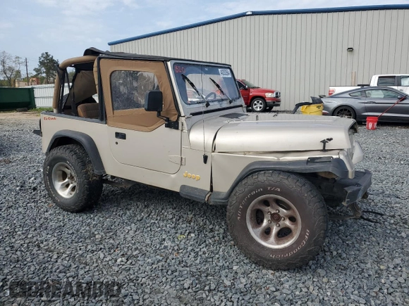 1995 Jeep Wrangler S with VIN 1J4FY19P0SP267541, listed as a Copart auction lot 48353564 with 153,985 mi miles and Salvage Title. Bid and sale history available at carsss.com. Image 4.