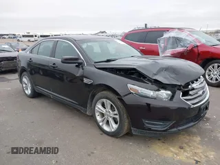 2014 Ford Taurus SEL z VIN 1FAHP2E85EG121636, wystawiony jako IAAI lot #41036886 z przebiegiem 117 460 mil mil oraz . Historia ofert i sprzedaży dostępna na DreamBid. Obrazek 1.