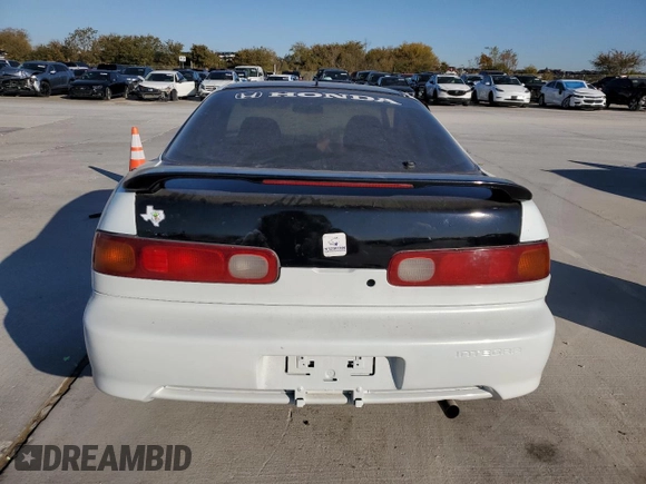 1999 Acura Integra SE with VIN JH4DC4463XS003082, listed as a Copart auction lot 83186044 with 196,255 mi miles and Salvage title. Bid and sale history available at DreamBid. Image 6.