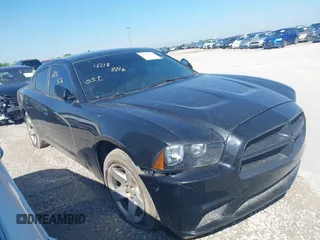 2014 Dodge Charger Police with VIN 2C3CDXAT9EH261962, listed as a IAAI auction lot 42183216 with 166,916 mi miles. Bid and sale history available at carsss.com. Image 1.