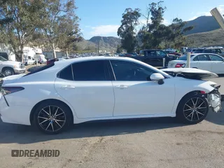 2023 Toyota Camry SE with VIN 4T1T11AK8PU836864, listed as a IAAI auction lot 41933124 with 50,263 mi miles and . Bid and sale history available at DreamBid. Image 13.