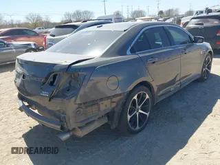 2015 Ford Taurus SEL with VIN 1FAHP2E84FG177553, listed as a IAAI auction lot 41753755 with 153,252 mi miles and . Bid and sale history available at carsss.com. Image 4.