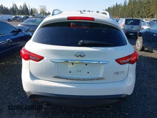 2014 Infiniti QX70 with VIN JN8CS1MW2EM411237, listed as a IAAI auction lot 42011806 with 148,133 mi miles and . Bid and sale history available at carsss.com. Image 16.