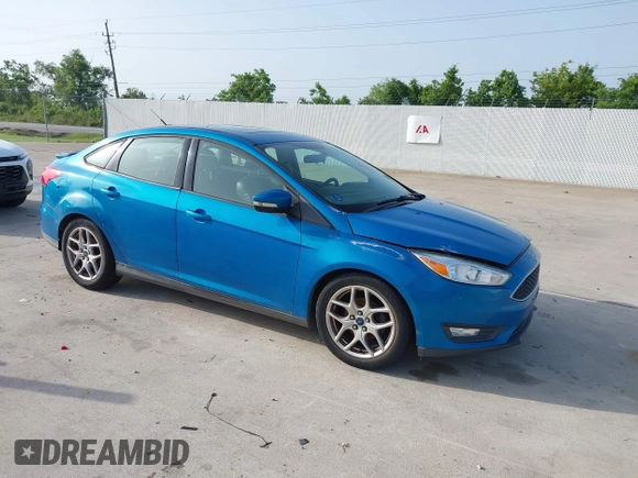 2015 Ford Focus SE with VIN 1FADP3F21FL326927, listed as a IAAI auction lot 42628577 with 112,199 mi miles and . Bid and sale history available at DreamBid. Image 1.