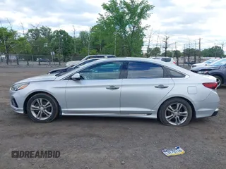 2019 Hyundai Sonata Sport z VIN 5NPE34AFXKH740037, wystawiony jako IAAI lot #42215038 z przebiegiem 79 714 mil mil oraz . Historia ofert i sprzedaży dostępna na DreamBid. Obrazek 14.