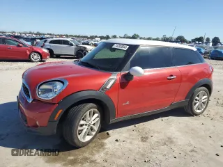 2014 MINI Paceman S with VIN WMWSS7C58EWN72230, listed as a Copart auction lot 74282684 with 116,501 mi miles and Salvage Title. Bid and sale history available at DreamBid. Image 1.