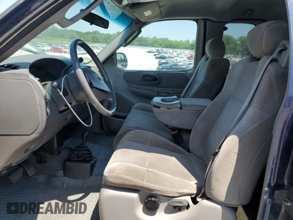 2002 Ford F-150 XL with VIN 1FTRX18L82NB06824, listed as a Copart auction lot 57342315 with 207,390 mi miles and Salvage title. Bid and sale history available at DreamBid. Image 7.