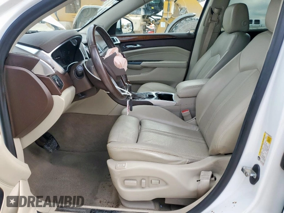 2014 Cadillac SRX Performance Collection with VIN 3GYFNCE39ES687733, listed as a Copart auction lot 62770665 with 151,714 mi miles and Salvage title. Bid and sale history available at DreamBid. Image 7.