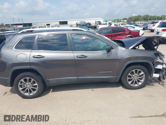 2019 Jeep Cherokee Latitude Plus z VIN 1C4PJLLB2KD333239, wystawiony jako IAAI lot #42144451 z przebiegiem 64 828 mil mil oraz . Historia ofert i sprzedaży dostępna na DreamBid. Obrazek 13.