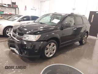2014 Dodge Journey Limited with VIN 3C4PDDDG7ET154300, listed as a IAAI auction lot 41640132 with 175,276 mi miles and . Bid and sale history available at DreamBid. Image 2.