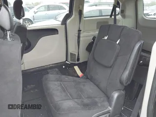 2014 Dodge Grand Caravan American Value with VIN 2C4RDGBG3ER104932, listed as a IAAI auction lot 42126784 with 171,206 mi miles and . Bid and sale history available at DreamBid. Image 8.