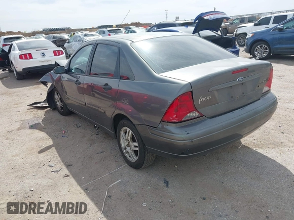 2004 Ford Focus ZTS with VIN 1FAFP38Z94W165483, listed as a IAAI auction lot 41775001 with 222,589 mi miles and . Bid and sale history available at carsss.com. Image 3.
