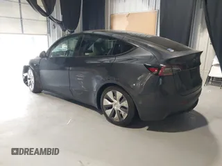 2024 Tesla Model Y Long Range z VIN 7SAYGDEEXRA226636, wystawiony jako IAAI lot #41622144 z przebiegiem 8 908 mil mil oraz . Historia ofert i sprzedaży dostępna na DreamBid. Obrazek 3.
