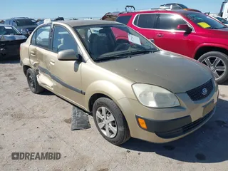 2009 Kia Rio LX with VIN KNADE223996510327, listed as a IAAI auction lot 41771476 with 212,748 mi miles and . Bid and sale history available at DreamBid. Image 1.