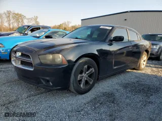 2012 Dodge Charger SXT with VIN 2C3CDXHG2CH204928, listed as a Copart auction lot 49602115 with 210,923 mi miles and Salvage Title. Bid and sale history available at carsss.com. Image 1.
