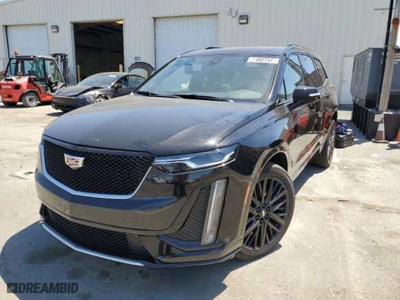 2023 Cadillac XT6 AWD Sport with VIN 1GYKPGRS2PZ130847, listed as a Copart auction lot 58174474 with 11,958 mi miles and Clean Title. Bid and sale history available at carsss.com. Image 1.