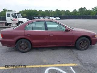 2003 Mitsubishi Galant ES z VIN 4A3AA46G53E215763, wystawiony jako IAAI lot #42275876 z przebiegiem 200 728 mil mil oraz . Historia ofert i sprzedaży dostępna na DreamBid. Obrazek 13.